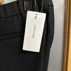 黒のフレアパンツ 折り目あり