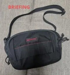BRIEFING ラウンドポーチ BG1812401 - メルカリ