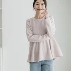 coca エンボス加工裾フレアトップス