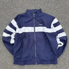 な*や様 90s 古着　アディダス　ナイロンジャケット　ネイビー　万国旗タグ　o