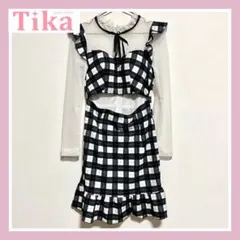 TIKA：長袖ウエストカット裾フリルネックリボンチェック柄タイトミニドレス M