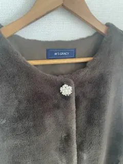 エムズグレイシー ロングファーベスト バックリボン