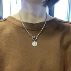 オールステンレス製 マンテルネックレス コインモチーフ付き