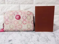 新品未使用 COACH コーチ ウェイバリー デージー コスメポーチ ピンクのサムネイル