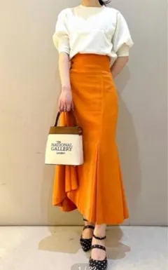 オレンジ フレアスカート ボタン付き