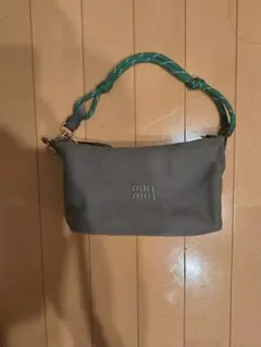 miumiuギャバジン ポーチ ミニハンドバッグ オリーブグリーン - メルカリ