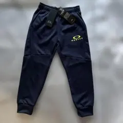 OAKLEY 子供服 パンツ 色ブラックアイリス タグ付きのサムネイル