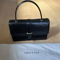 【TOUT Y EST】パラレルバッグ ブラック 新品未使用品 TOUT Y EST】パラレルバッグ ブラック 新品未使用品 - メルカリ