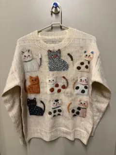 クリーム色ニットセーター