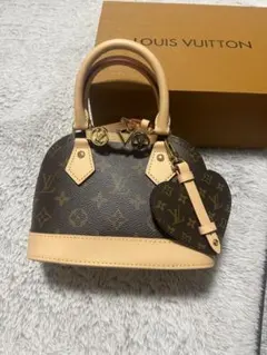 LOUIS VUITTON 附心形吊飾手提包