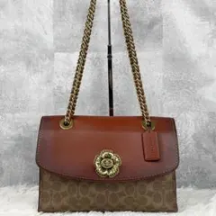 美品 コーチ PVC ショルダー パーカー リベット ローズ シグネチャー 茶