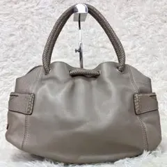 美品✨COLE HAAN 巾着風トートバッグ 上質レザー編み込みハンドル A4可