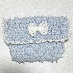 ハンドメイド 編み物 ポーチ リボン フリル 水色 ライトブルー 小物入れ