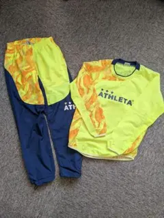 ATHLETA ピステ上下150サイズ 蛍光イエロー/オレンジ
