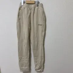 New Balance ベージュ ロングパンツ