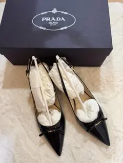 PRADA パンプス ポインテッドトゥ パンチングレザー 黒 - メルカリ
