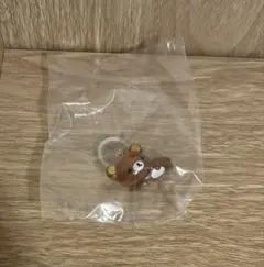 リラックマ　クリアマスコットチャーム　ねころび　めじるし