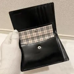 【未使用に近い】バーバリー 二つ折り財布 ブラック ノバチェック