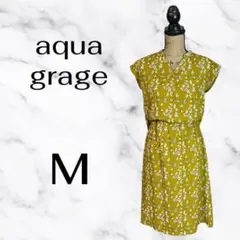 美品✨【aquagarage】花柄ノースリーブドッキングワンピース　イエローMのサムネイル