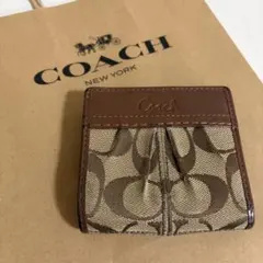 COACH 折りたたみ ミニ財布のサムネイル