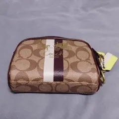 Coach ロゴ入りポーチ ベージュ