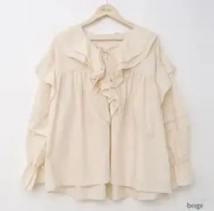 nugu ブラウスtinker bell frill shirts ベージュ