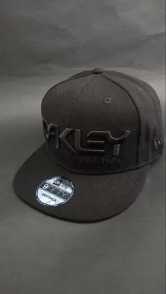 OAKLEY✕NEWERAオールブラックスナップバックキャップ 9FIFTY
