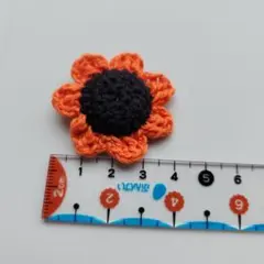 かぎ針編み 花形 ヘアゴム オレンジ　ハンドメイド品