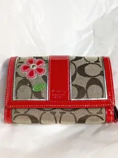 コーチ 二つ折り財布 花刺繍　未使用品