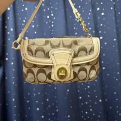 COACH シグネチャー ターンロック ポーチ ミニバッグ