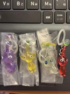ピクミン めじるしアクセサリー 4個セット 紫 黄 ヒカリ 赤ピクミンのサムネイル