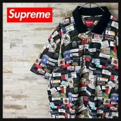 2692 U【希少デザイン・美品】シュプリーム☆ロゴ満載 総柄 ポロシャツのサムネイル