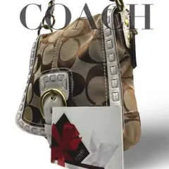 【良品】コーチ　ショルダーバッグ　シグネチャーベルト　斜め掛け　チャーム　大容量