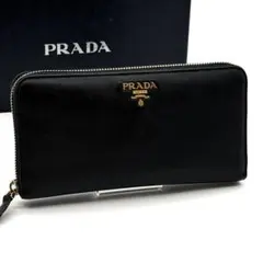 RIFD認証 PRADA 長財布 ラウンド シボ革 黒 三角ロゴ 1ML506 - メルカリ