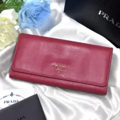 プラダ 長財布 ラウンドファスナー リボン ロゴ金具 ピンク 