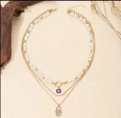 パールとゴールドの3連ネックレス