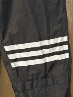 アディダスadidas黒ウインドパンツ中綿XO野球5APSFTライン.USED