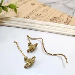 【プチプラ】ピアス　イヤリング　土星　アシンメトリー　黄色