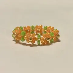 ③ビーズリングオレンジお花ハンドメイド