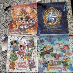 ディズニーシー　ディズニーランド 周年記念巾着　４枚セット