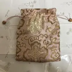 ピンクの金色刺繍巾着袋