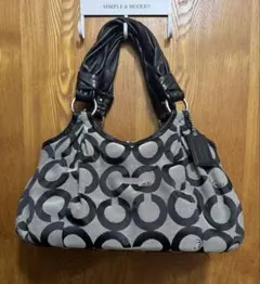 COACH 黒 がま口ハンドバッグ