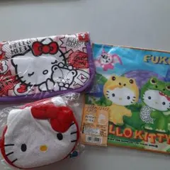 ハローキティ★プチタオル 40周年記念★マルチケース ちりめん★お顔型ポーチ