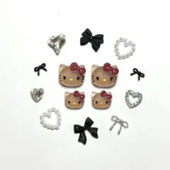 サンリオ日焼けキティネイルパーツマットモノクロ黒ブラックリボンハートキラキラ