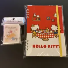 新品未開封品　ハローキティ50周年　ブック型セロハンテープ＆B6リングノートのサムネイル