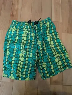 ATHLETA ショートパンツ グリーン 総柄 Lサイズのサムネイル