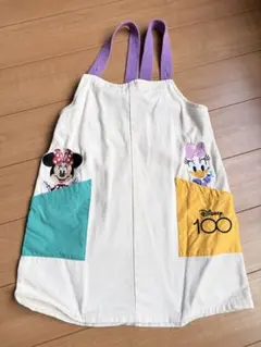 ディズニー100周年記念エプロン - メルカリ