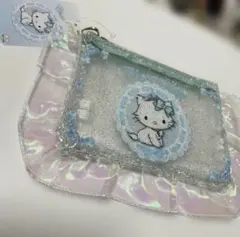 新品タグ付 ハローキティチャーミーキティ 水色フリルクリアポーチ激レア完売のサムネイル