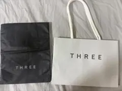 スリー THREE ショッパー 紙袋のサムネイル