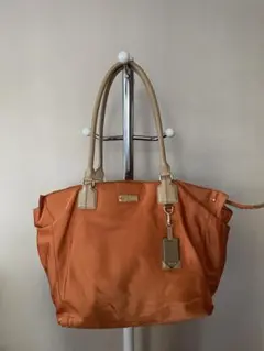 TUMI オレンジ トートバッグのサムネイル